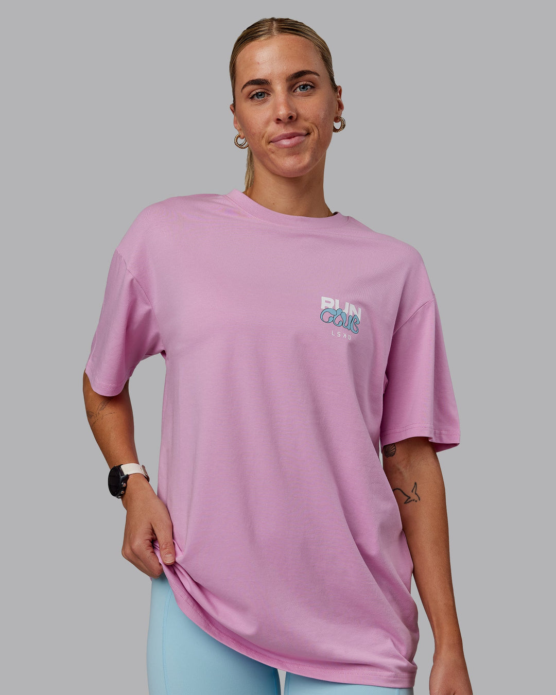 Woman wearing Unisex Gone Running FLXCotton Tee Oversize - Bubblegum-Skyride