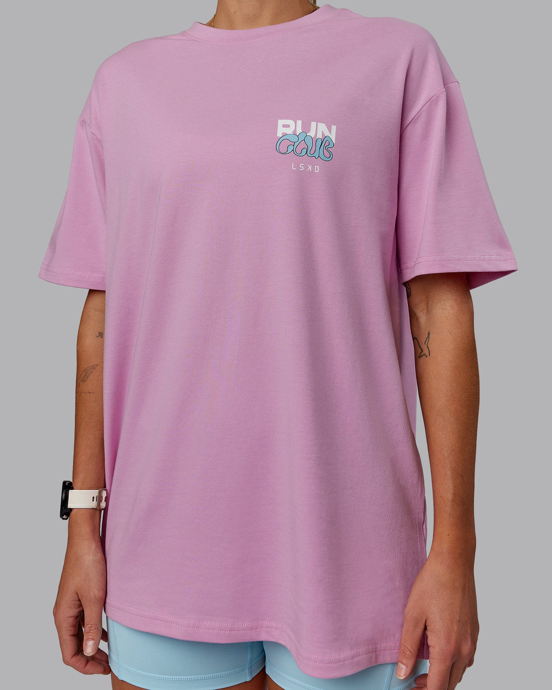 Woman wearing Unisex Gone Running FLXCotton Tee Oversize - Bubblegum-Skyride