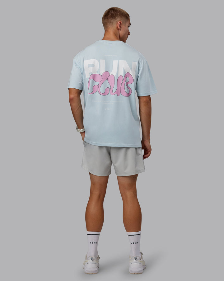 Man wearing Unisex Gone Running FLXCotton Tee Oversize - Skyride-Bubblegum
