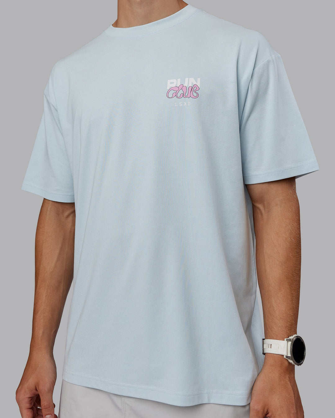 Man wearing Unisex Gone Running FLXCotton Tee Oversize - Skyride-Bubblegum