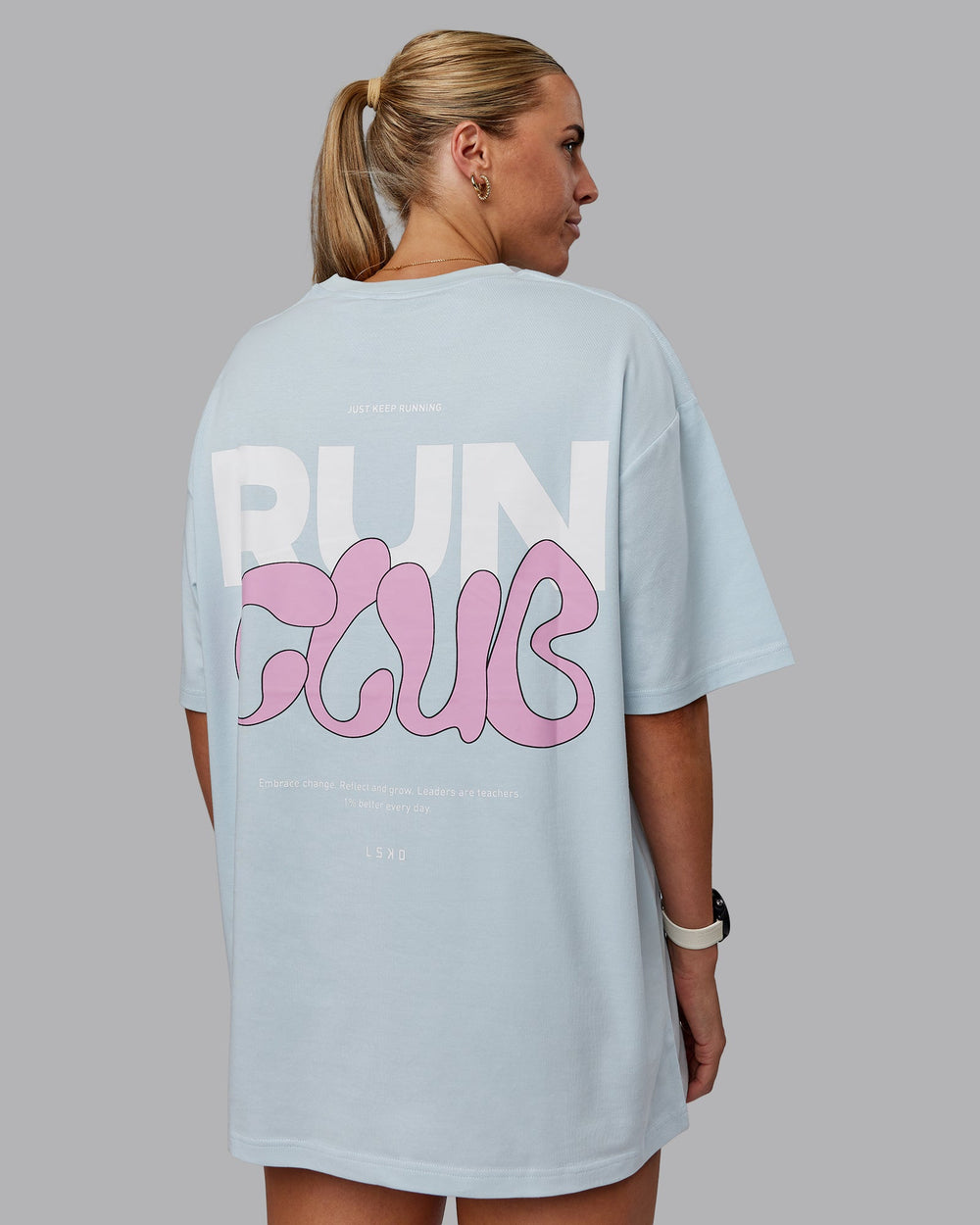 Woman wearing Unisex Gone Running FLXCotton Tee Oversize - Skyride-Bubblegum