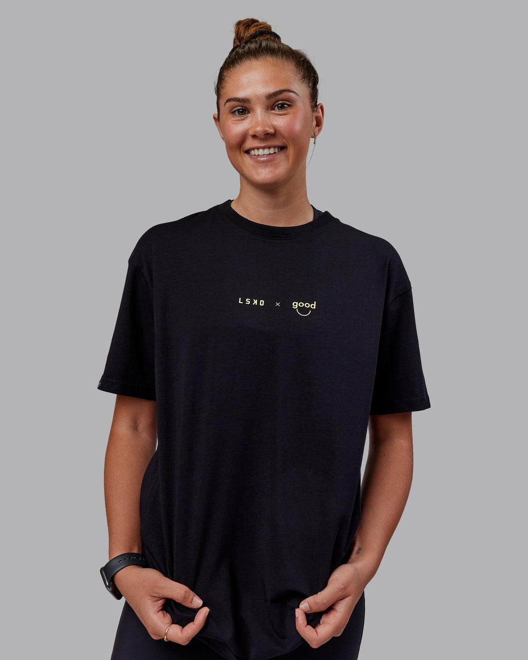 Woman wearing The Good Human Factory FLXCotton Tee Oversize - Black