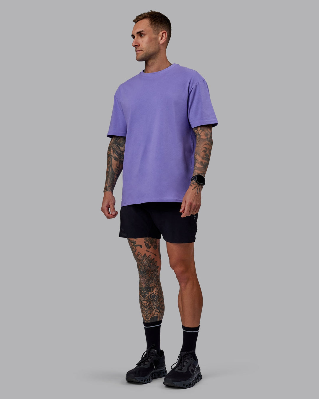 Man wearing Unisex Keep On Running FLXCotton Tee Oversize - Dahlia Purple