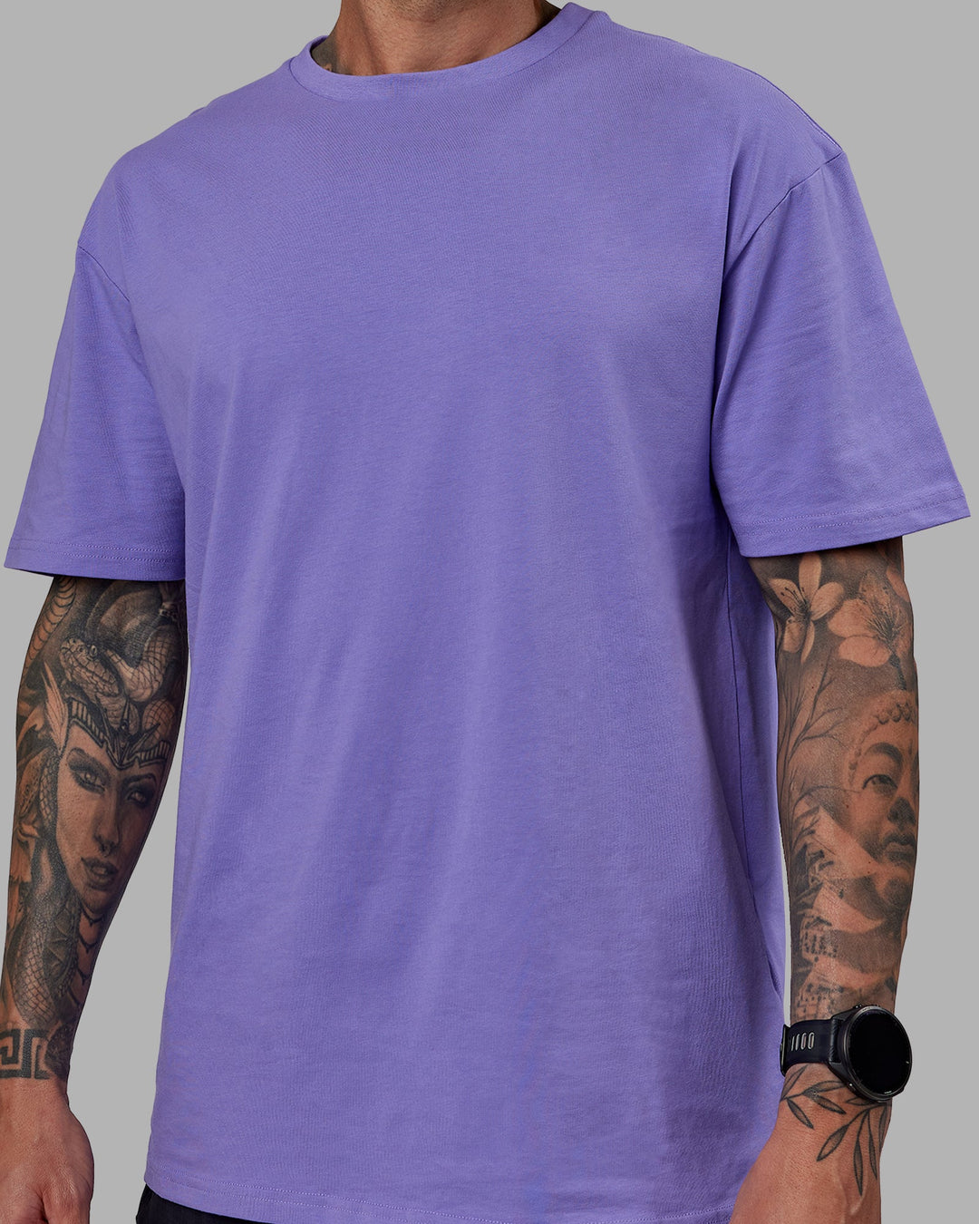 Man wearing Unisex Keep On Running FLXCotton Tee Oversize - Dahlia Purple