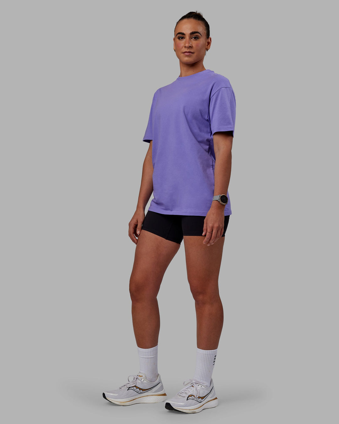 Woman wearing Unisex Keep On Running FLXCotton Tee Oversize - Dahlia Purple