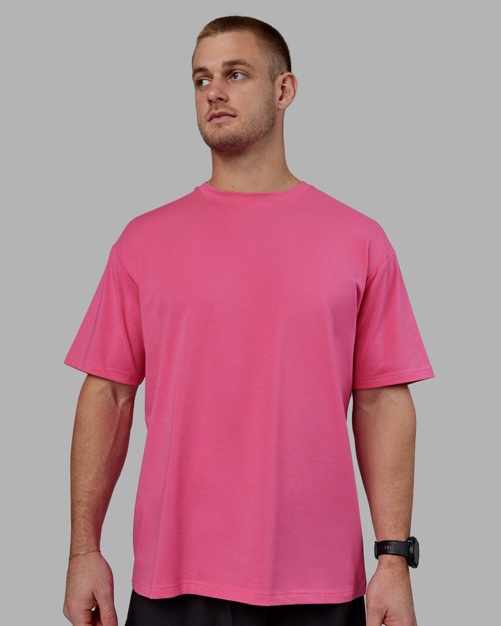 Man wearing Unisex Lifting Club FLXCotton Tee Oversize - Carmine Rose-White
