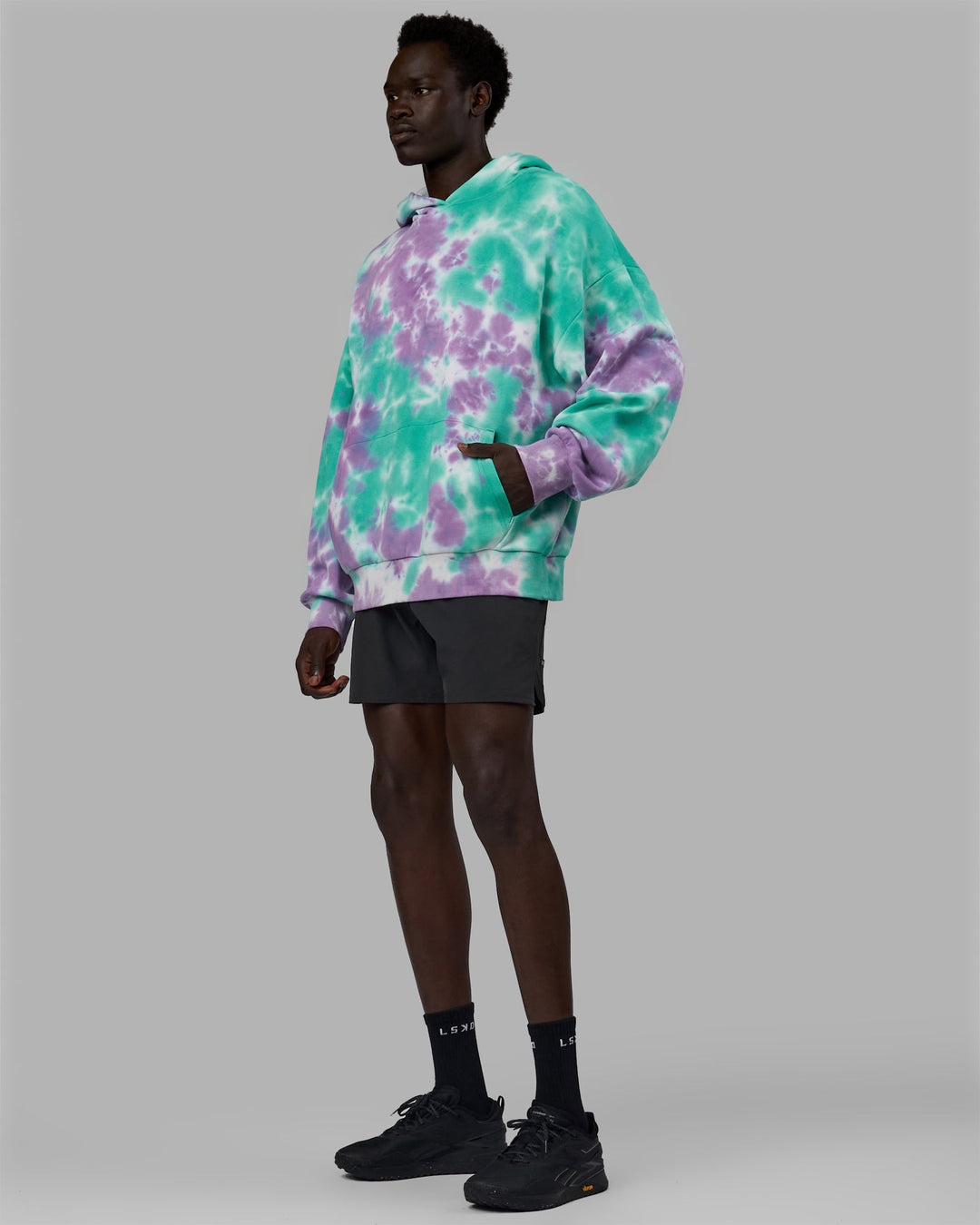 Man wearing Unisex Lifting Club Hoodie Oversize - Cockatoo-Tie Dye