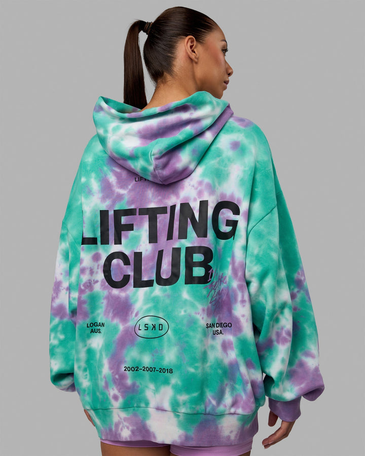 Woman wearing Unisex Lifting Club Hoodie Oversize - Cockatoo-Tie Dye
