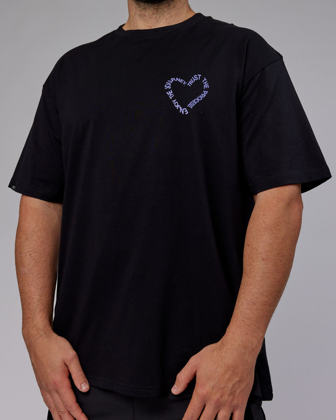 Man wearing Unisex Love The Process FLXCotton Tee Oversize - Black-Dahlia Purple