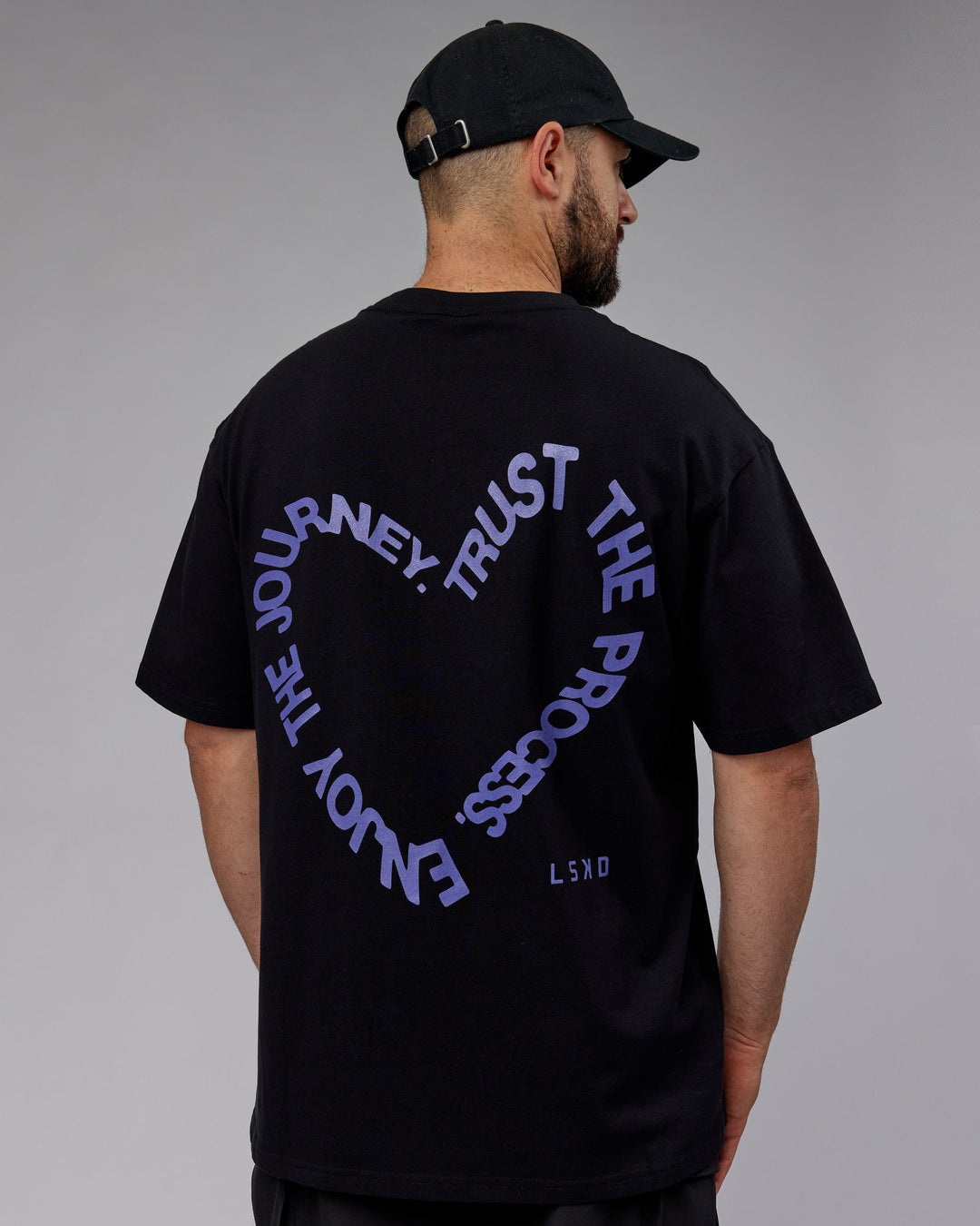 Man wearing Unisex Love The Process FLXCotton Tee Oversize - Black-Dahlia Purple