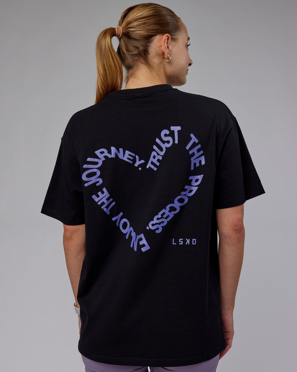 Woman wearing Unisex Love The Process FLXCotton Tee Oversize - Black-Dahlia Purple