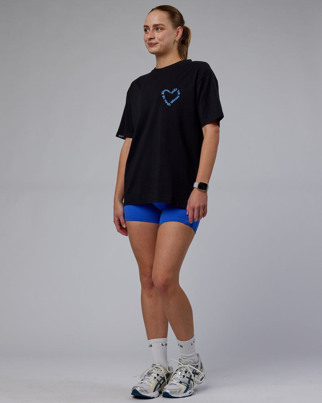 WOman wearing Unisex Love The Process FLXCotton Oversize Tee - Black-Power Cobalt