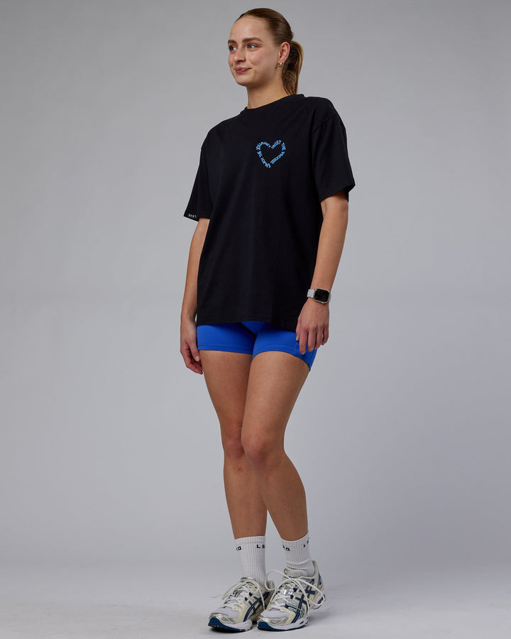 WOman wearing Unisex Love The Process FLXCotton Oversize Tee - Black-Power Cobalt
