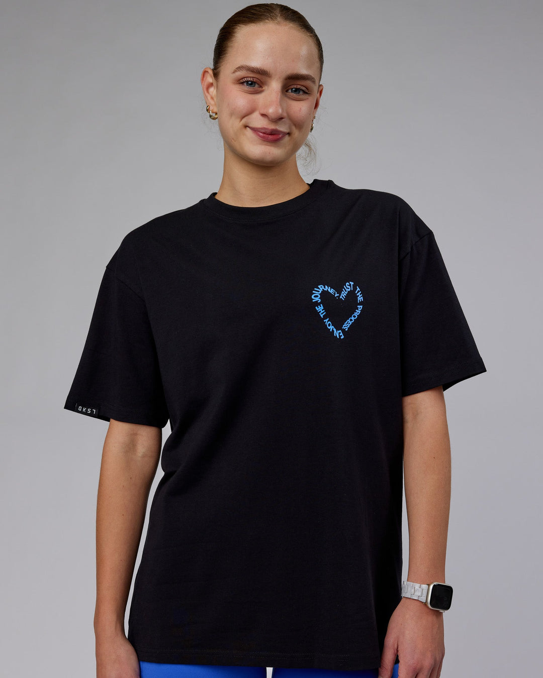 Woman wearing Unisex Love The Process FLXCotton Oversize Tee - Black-Power Cobalt