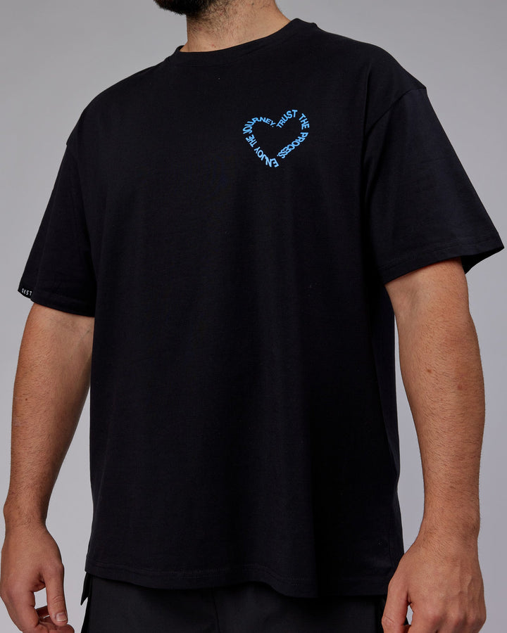 Man wearing Unisex Love The Process FLXCotton Oversize Tee - Black-Power Cobalt
