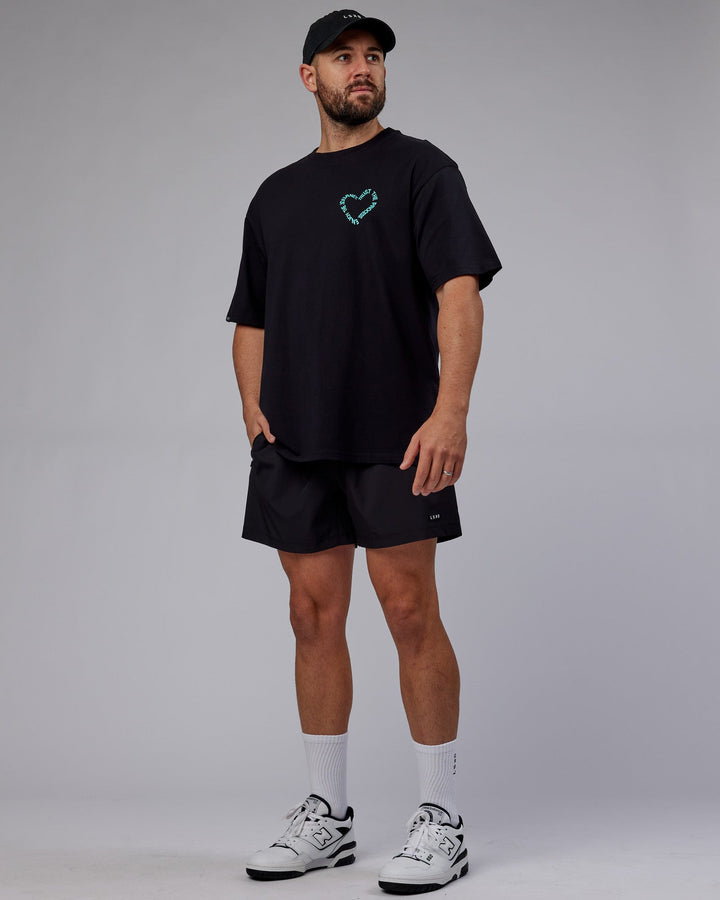 Man wearing Unisex Love The Process FLXCotton Tee Oversize - Black-Turquoise Tide
