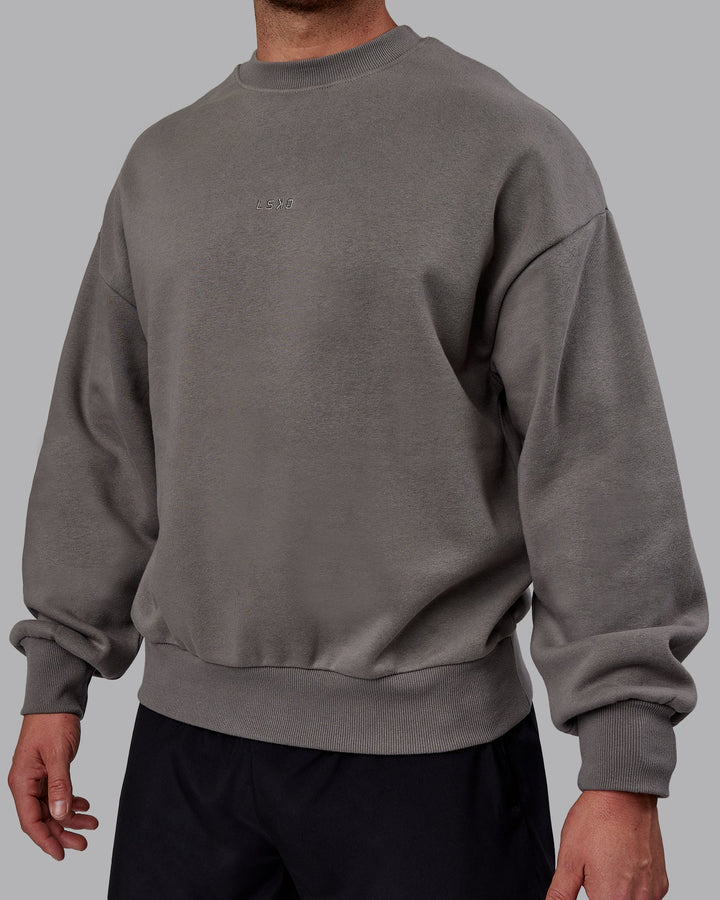 Man wearing Unisex MVP Sweater Oversize - Storm Front
