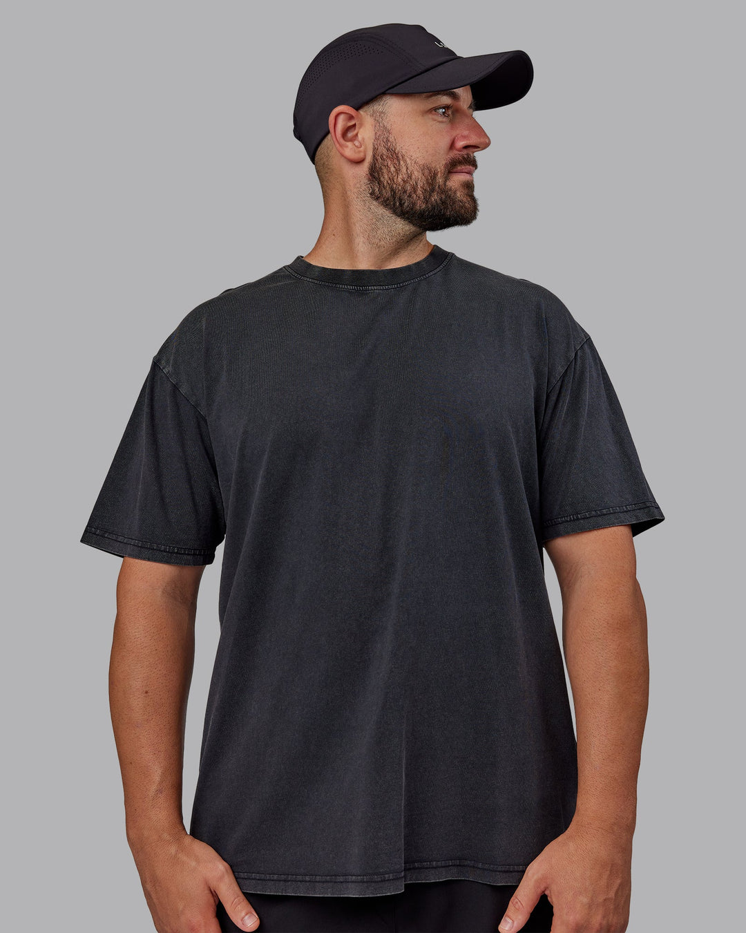 Man wearing Unisex Miami25 Washed FLXCotton Tee Oversize - Black-Amethyst