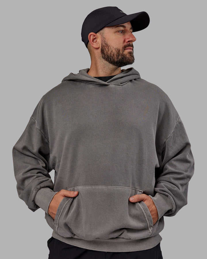 Man wearing Unisex Miami25 Washed Hoodie Oversize - Storm Front
