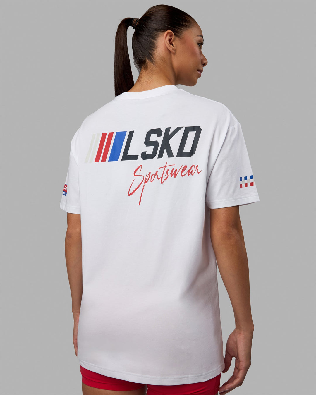 Woman wearing Unisex Redline FLXCotton Tee Oversize - White-Navy
