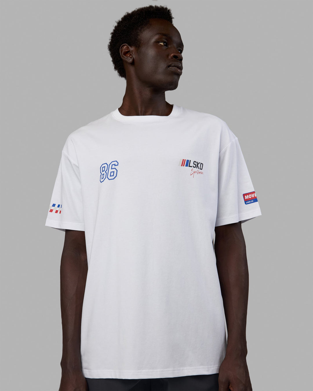 Man wearing Unisex Redline FLXCotton Tee Oversize - White-Navy