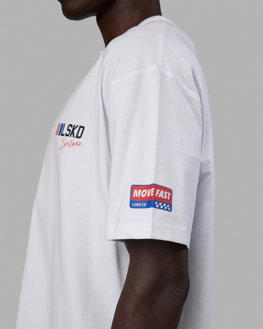 Man wearing Unisex Redline FLXCotton Tee Oversize - White-Navy