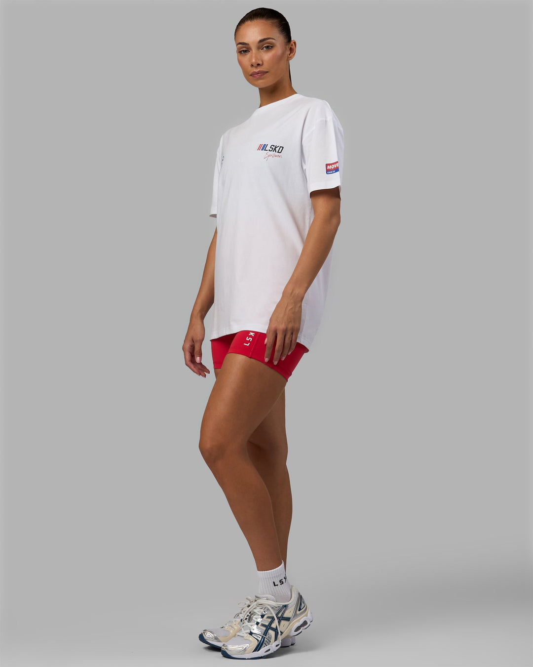 Woman wearing Unisex Redline FLXCotton Tee Oversize - White-Navy