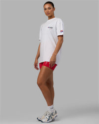 Woman wearing Unisex Redline FLXCotton Tee Oversize - White-Navy