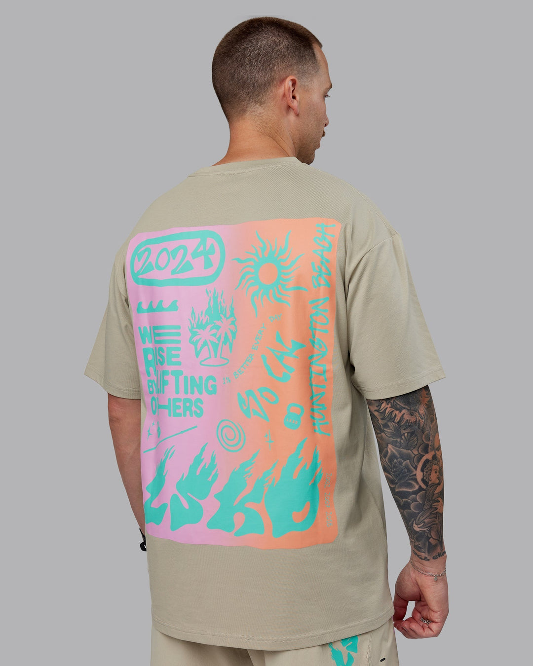 Man wearing Unisex So Cal 24 FLXCotton Tee Oversize - Sustained Grey-Atlantis