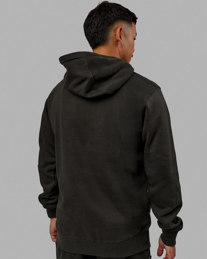 Man wearing Unisex Structure Hoodie - Pirate Black-Black
