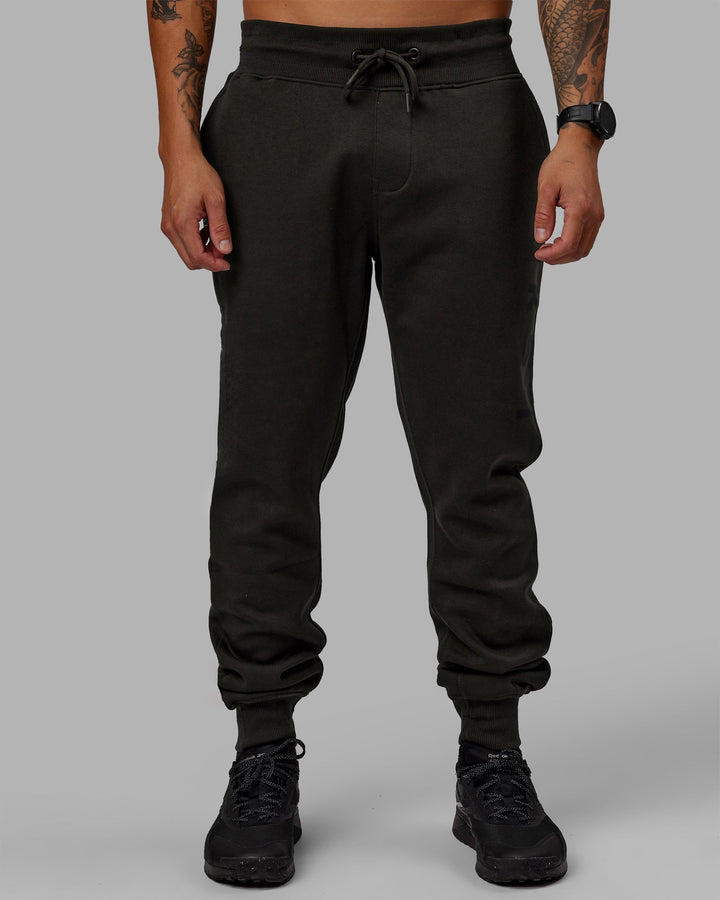 Man wearing Unisex Structure Joggers - Pirate Black-Black