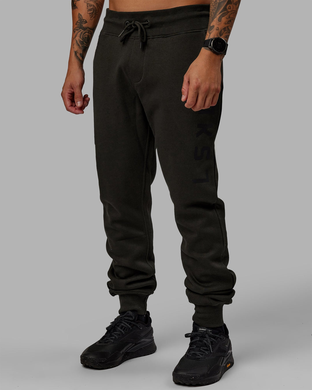 Man wearing Unisex Structure Joggers - Pirate Black-Black