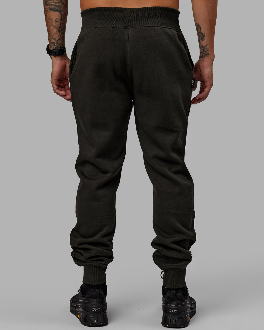 Man wearing Unisex Structure Joggers - Pirate Black-Black