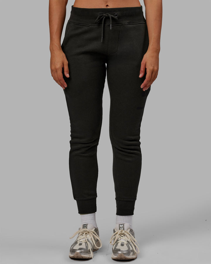 Woman wearing Unisex Structure Joggers - Pirate Black-Black
