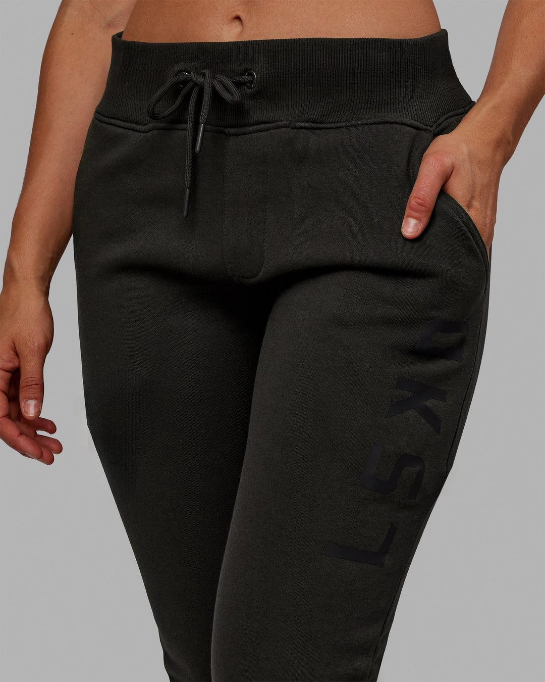 Woman wearing Unisex Structure Joggers - Pirate Black-Black