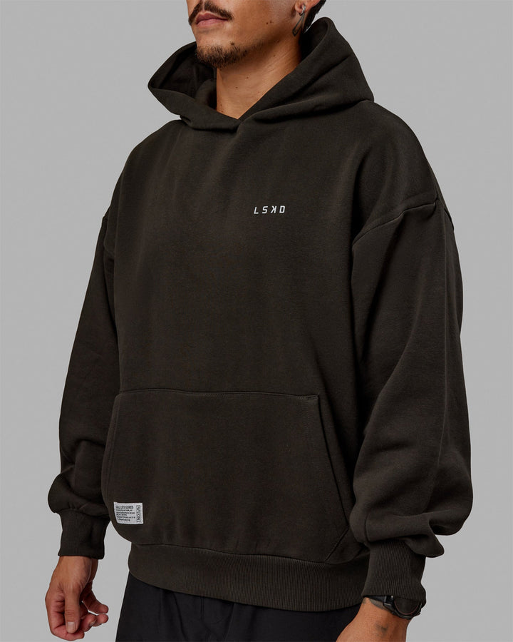 Man wearing Unisex VS5 Hoodie Oversize - Pirate Black-Circular Grey