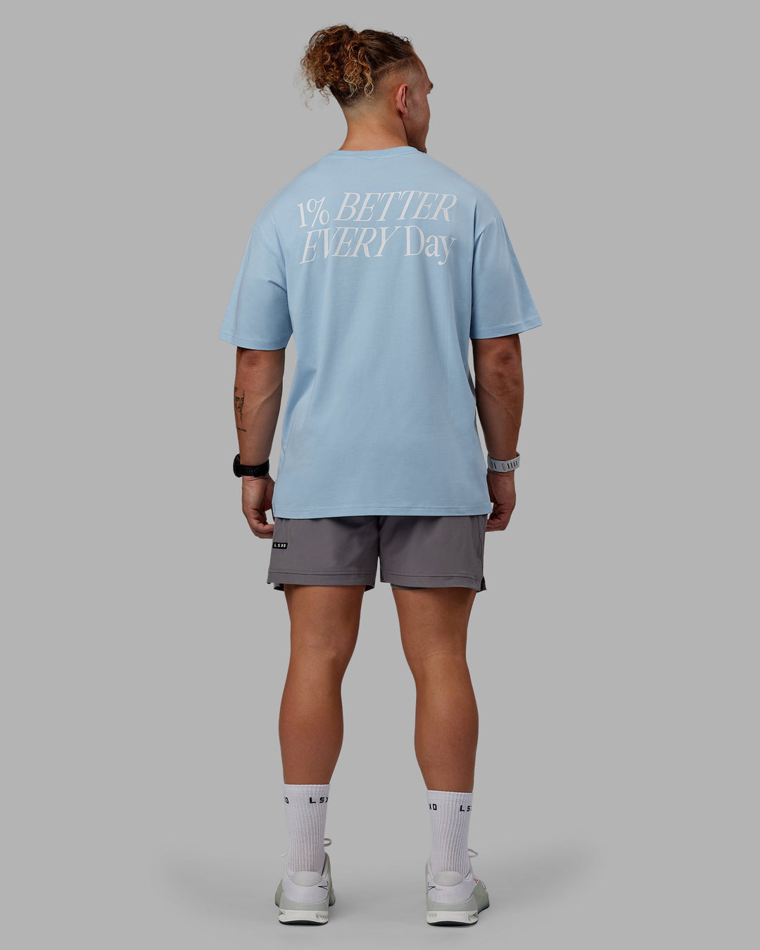 Man wearing Unisex VS6 FLXCotton Tee Oversize - Glacial Blue-White