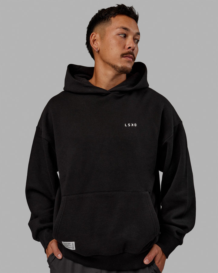 Man wearing Unisex VS6 Hoodie Oversize - Black-White