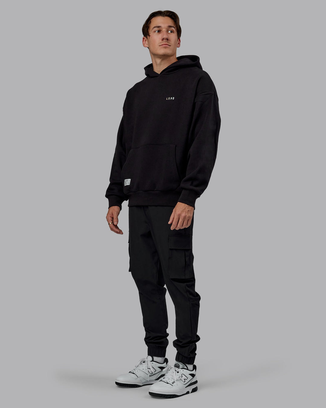 Man wearing Unisex VS6 Hoodie Oversize - Pride-Black