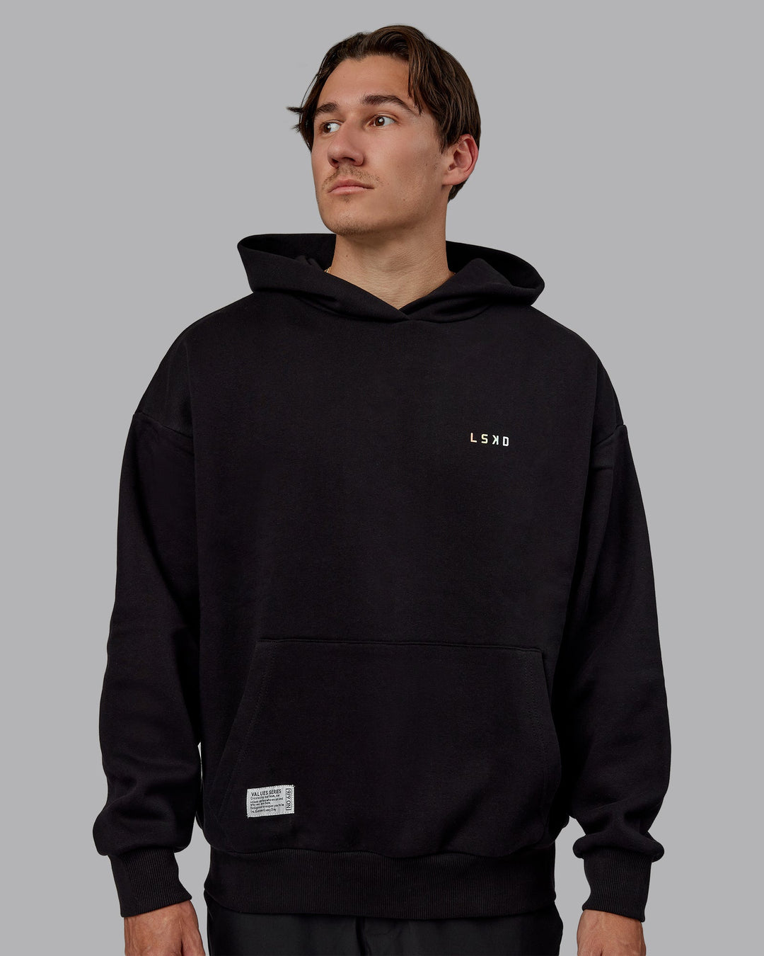 Man wearing Unisex VS6 Hoodie Oversize - Pride-Black