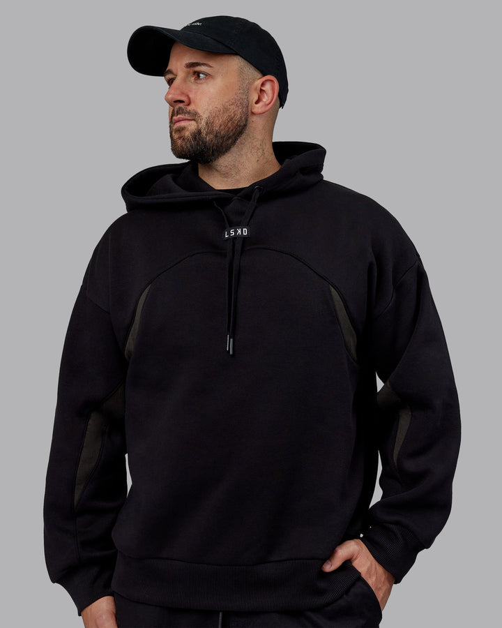 Man wearing Unisex Y2K Concept Panel Hoodie - Black-Black-Pirate Black
