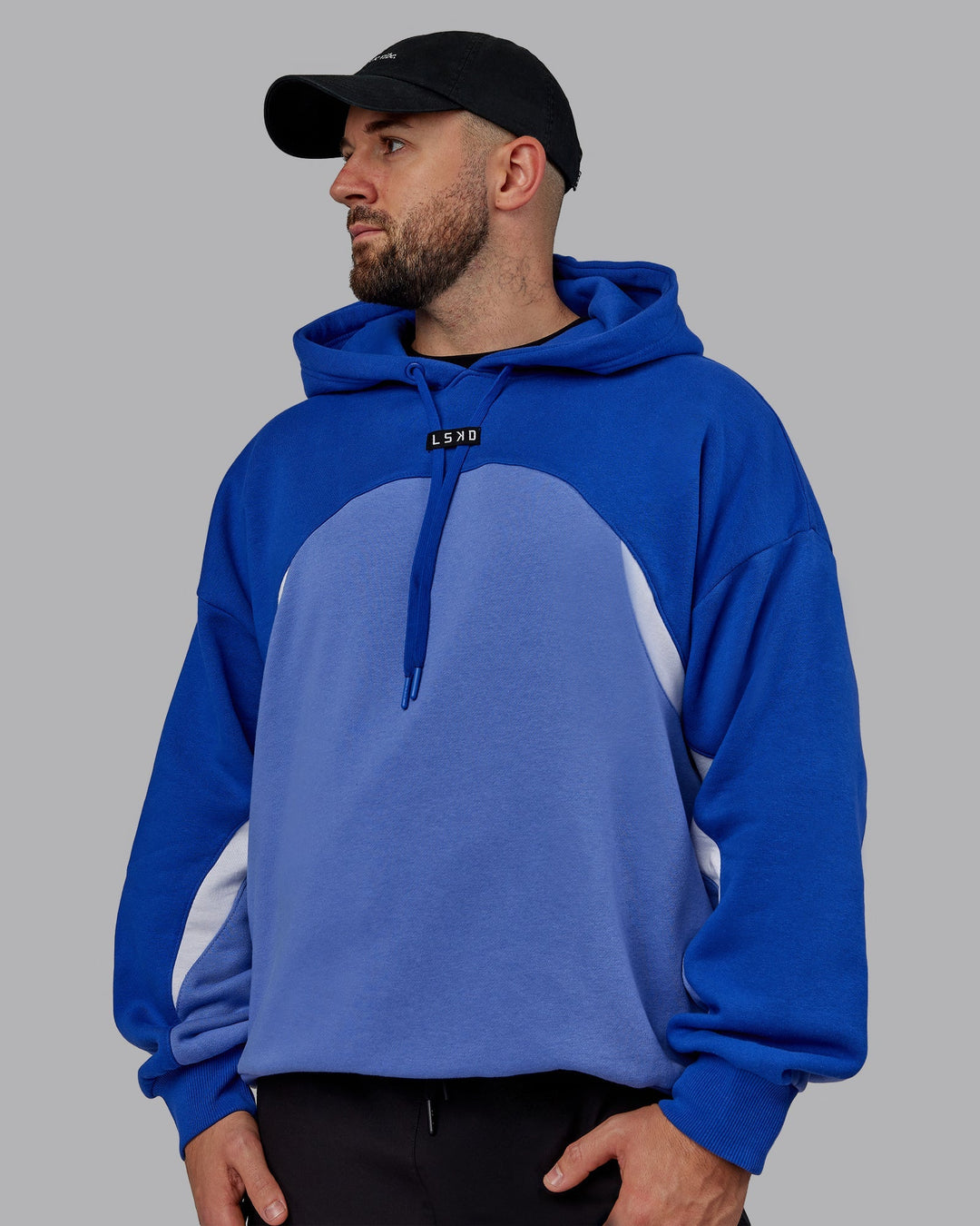 Duo wearing Unisex Y2K Concept Panel Hoodie - Power Cobalt-White