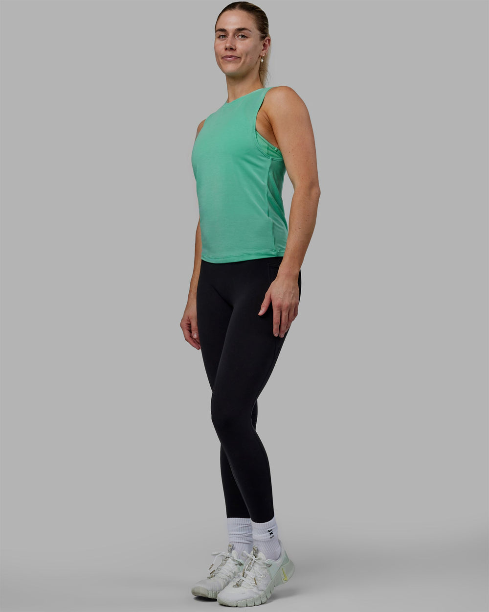 Woman wearing Vital Training Tank - Cockatoo