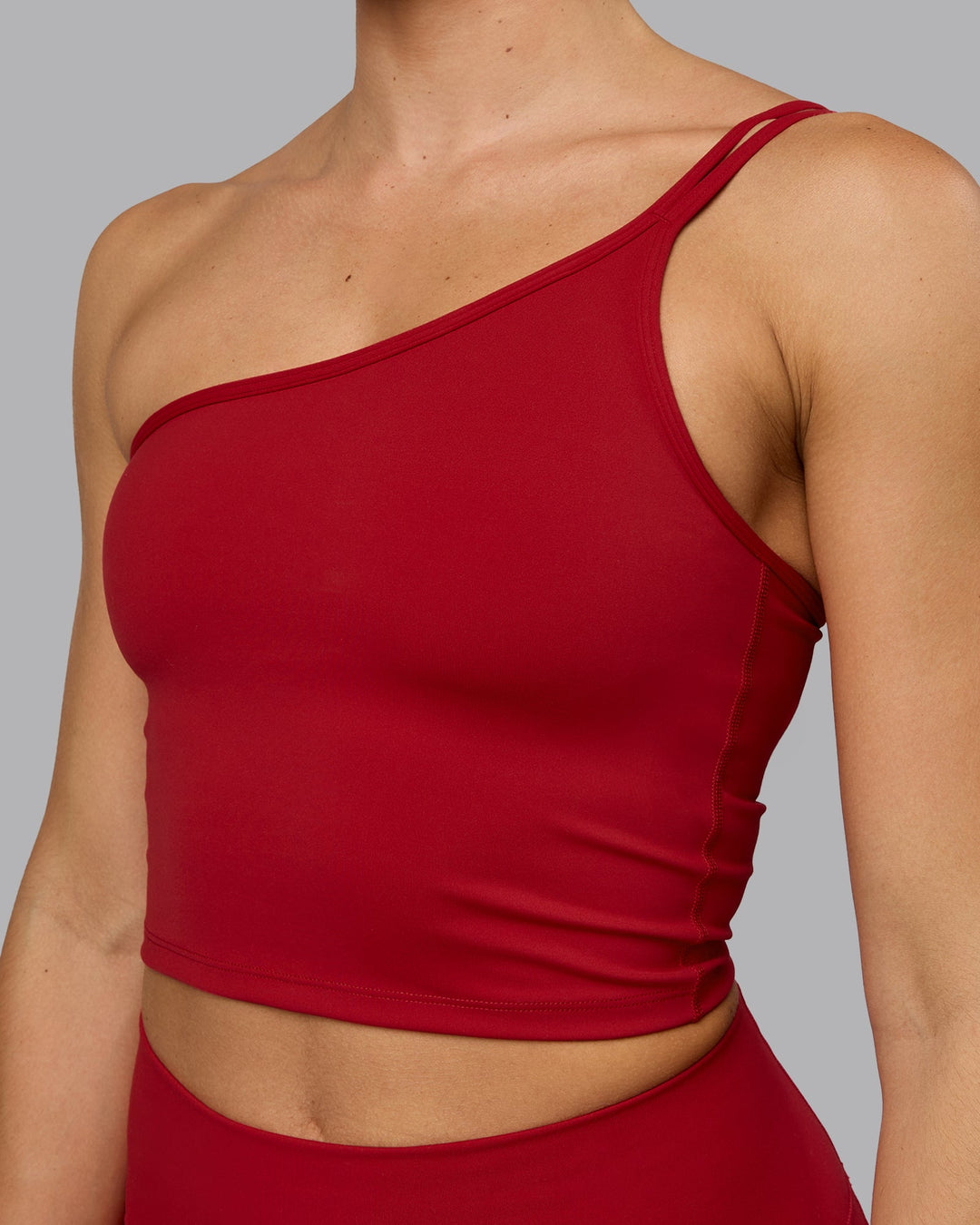 Woman wearing Vivid Skimmer Shelf Bra Tank - Cherry Red