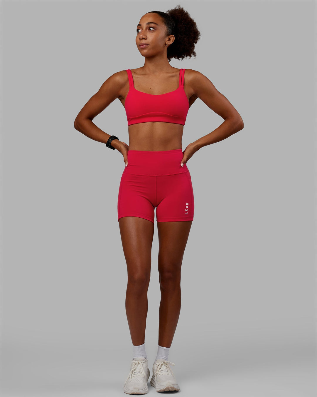 Woman wearing Vogue Sports Bra - Scarlet