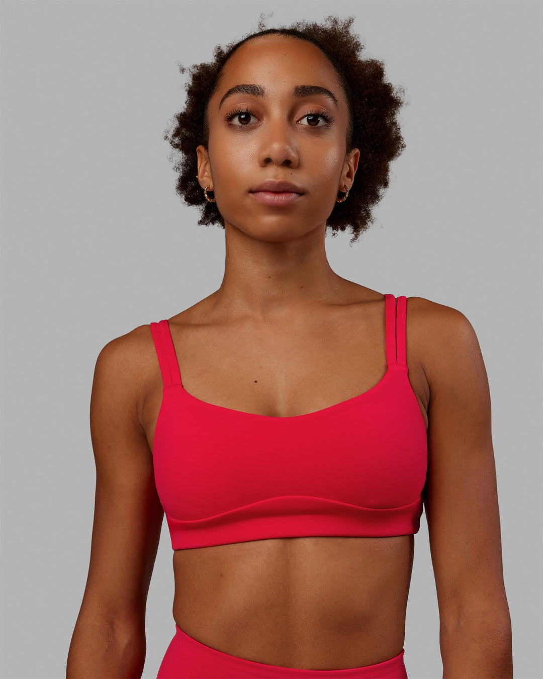 Woman wearing Vogue Sports Bra - Scarlet