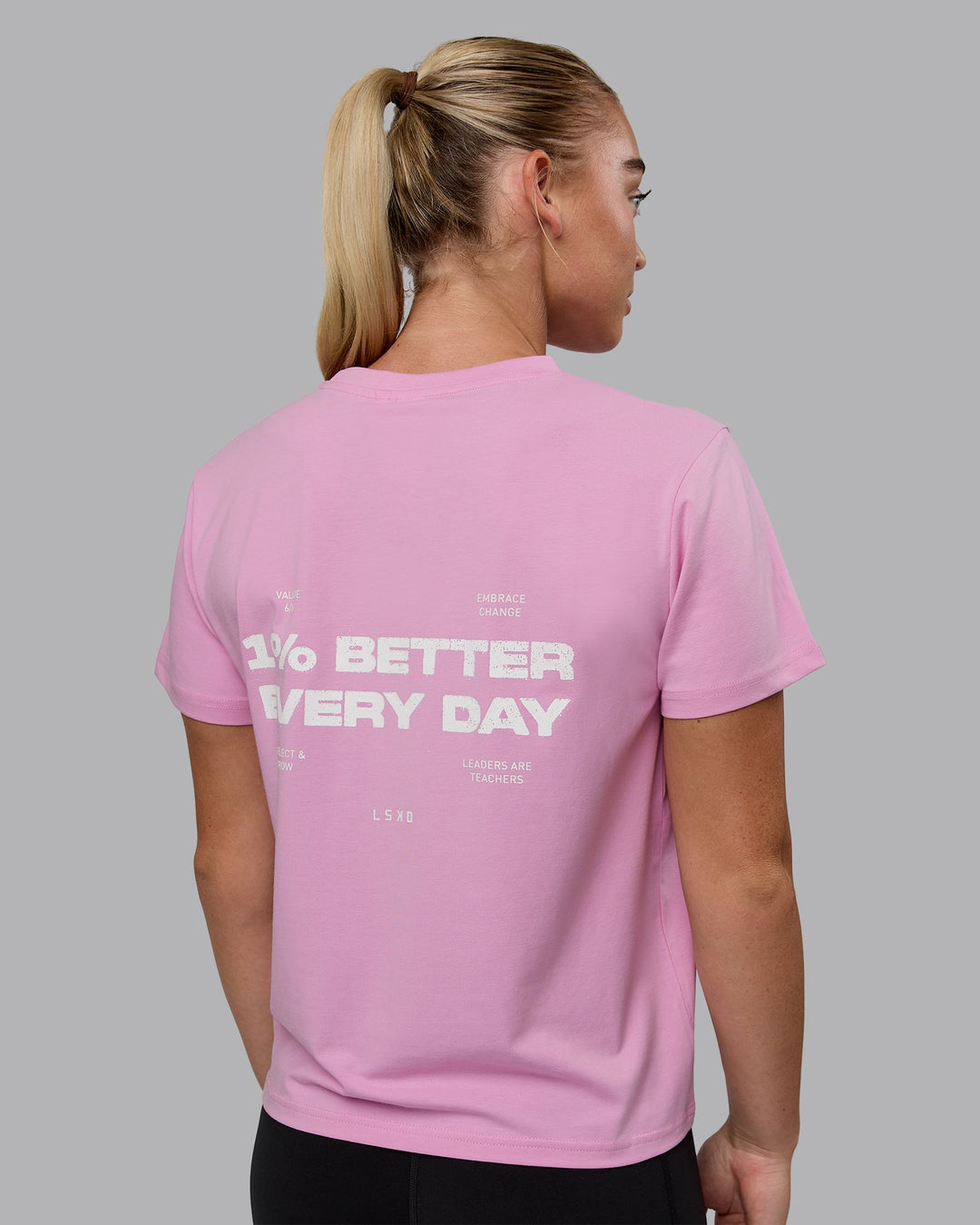 Woman wearing 1% Better Value Series FLXCotton Tee - Bubblegum-White