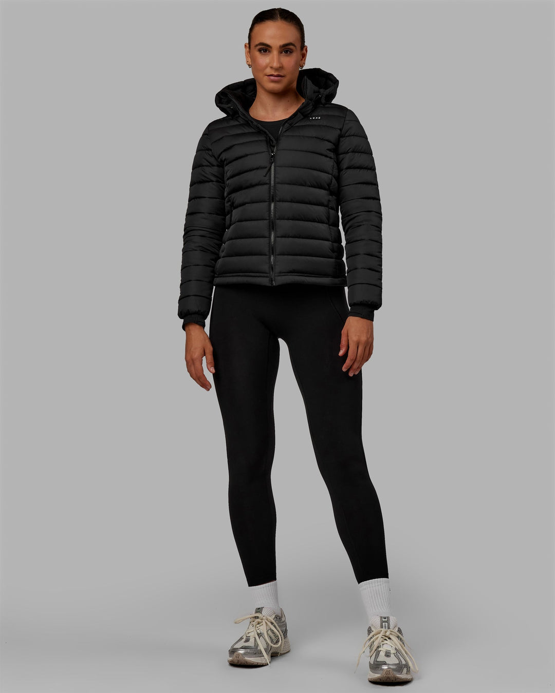 Woman wearing All Day Puffer Jacket - Black