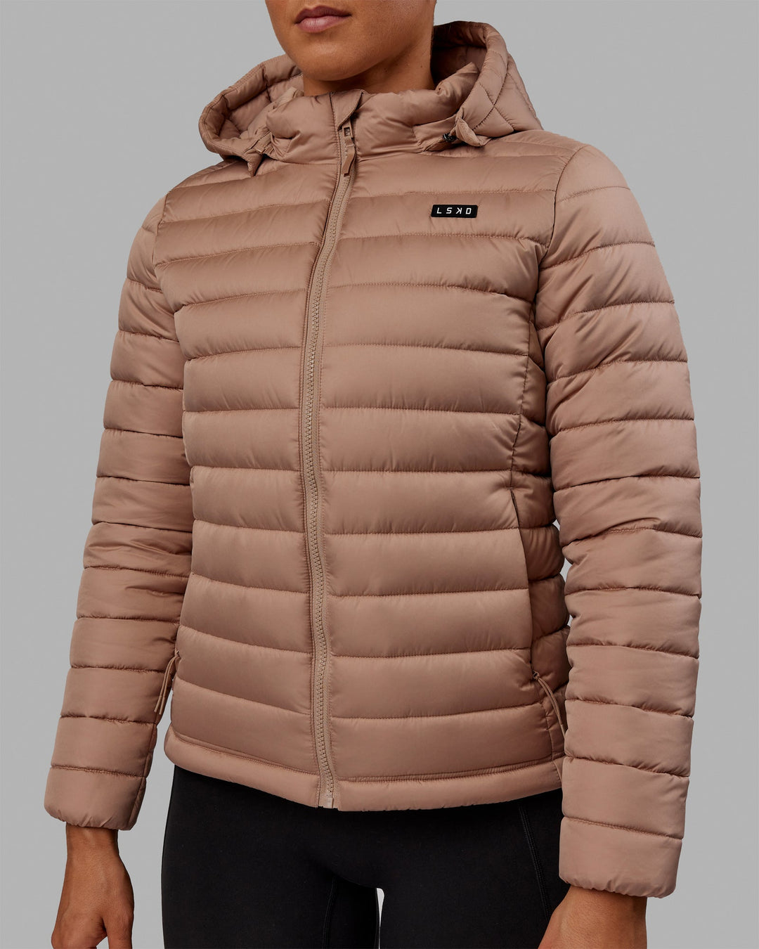 Woman wearing All Day Puffer Jacket - Desert