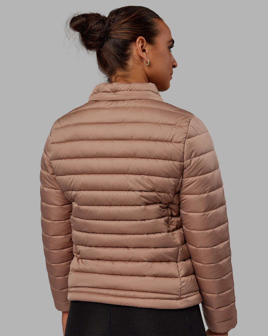 Woman wearing All Day Puffer Jacket - Desert